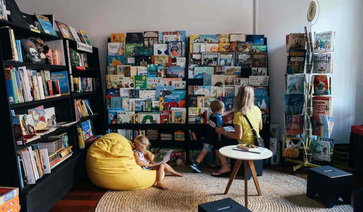 children reading books in a library