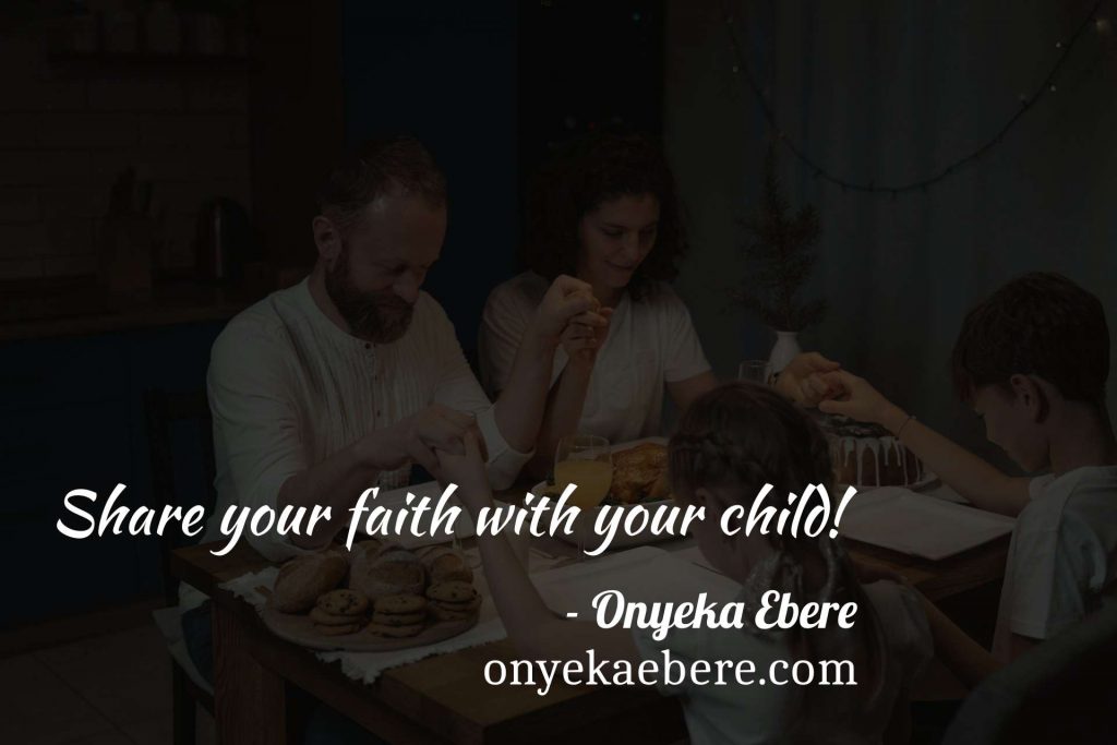 A family sitting around a table and praying