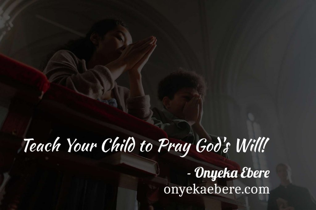 A mother and her child praying inside a church